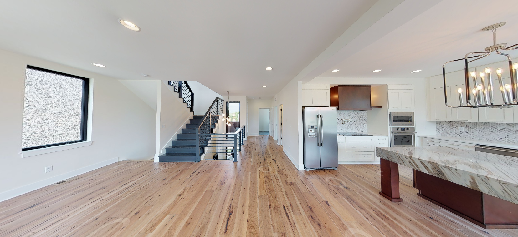 Open-concept interior of a completed EE DevCo new-construction home in the Beacon Hill neighborhood of Kansas City