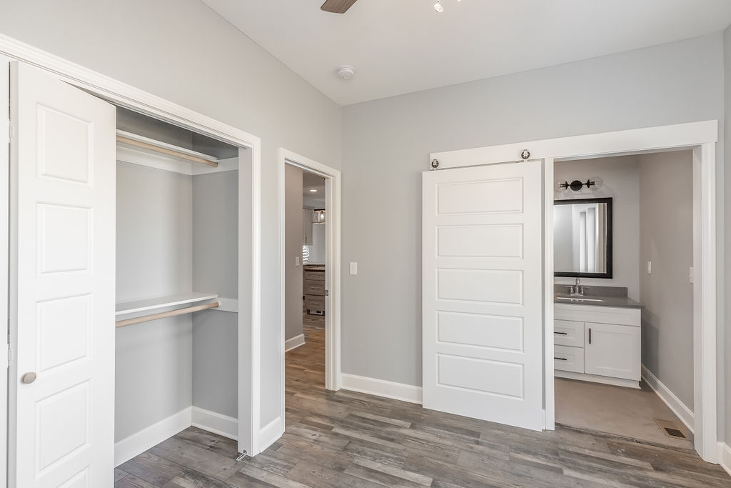 Finished primary bedroom suite in a Longfellow home