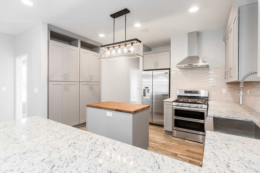 Finished kitchen in a Longfellow new-construction home
