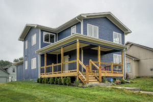 Monarch Manor new-construction home with covered porch