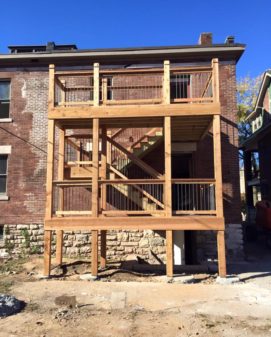 Multi-family building renovation with new framing and decks in progress